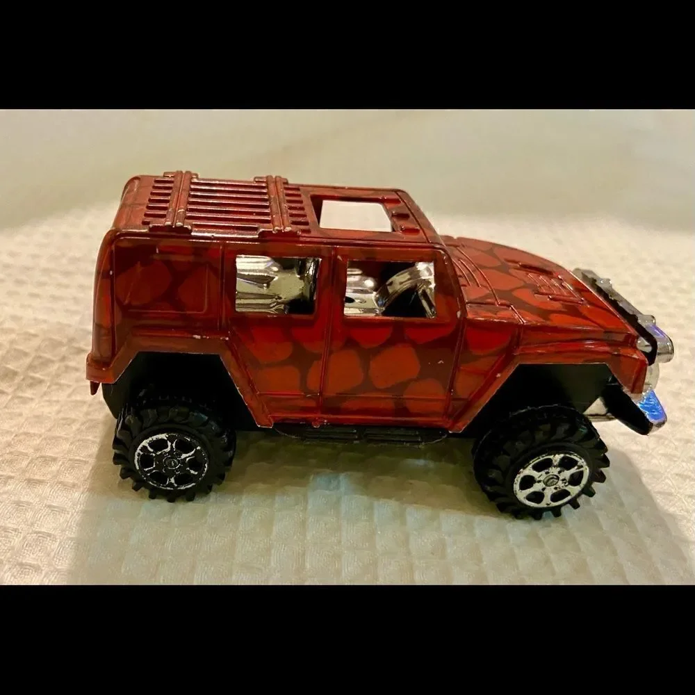Vintage Lot Of 3 Toy 4 X 4 Trucks W Animal Prints Good Condition Unbranded.